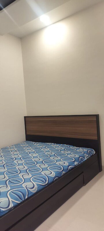 Bedroom in 2 BHK Apartment at Romell Umiya Grandeur, Goregaon East – for Rent
