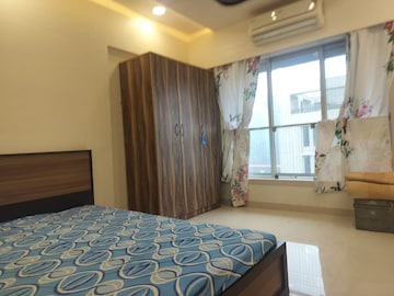 Bedroom in 2 BHK Apartment at Romell Umiya Grandeur, Goregaon East – for Rent