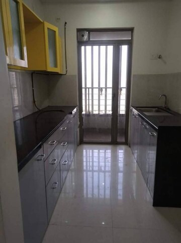 Kitchen in 2 BHK Apartment at Kalpataru Paramount, Kapur Bawdi – for Rent