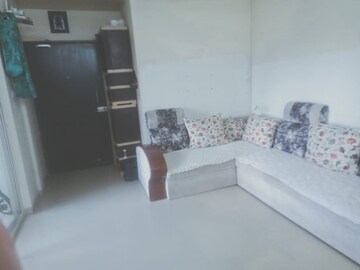 Living Room in 2 BHK Apartment at Sky Heights II, Pisoli – for Sale