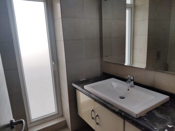 Bathroom in 3 BHK Apartment at Mahindra Luminare, Sector 59 – for Rent
