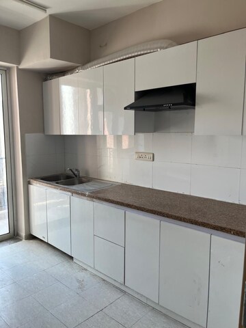 Kitchen in 4 BHK Apartment at DLF New Town Heights II, Sector 86 – for Rent