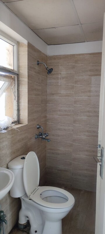 Bathroom in 3 BHK Builder Floor at Bptp Park Floors I, Sector 77 – for Rent