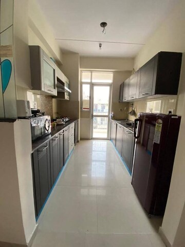Kitchen in 2 BHK Apartment at Gaur City 2 - 14th Avenue, Sector 16c Greater Noida – for Rent