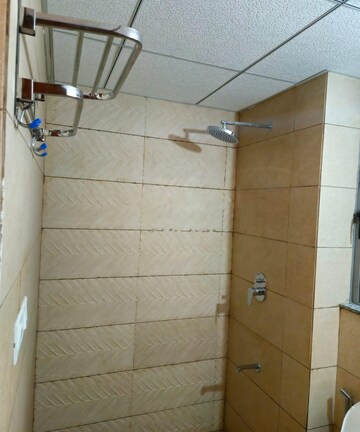 Bathroom in 1 BHK Apartment at Kalpataru Immensa, Kolshet Road – for Rent