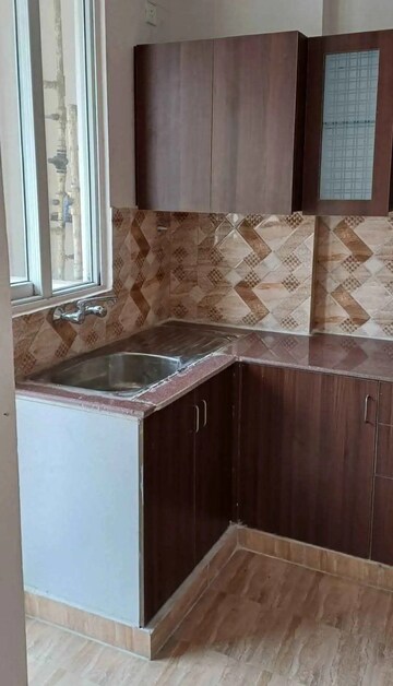 Kitchen in 2 BHK Apartment at Gaur City 2 - 14th Avenue, Sector 16c Greater Noida – for Rent