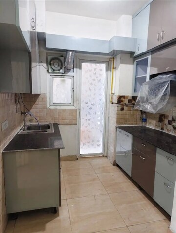 Kitchen in 2 BHK Apartment at AIG Park Avenue, Sector 4 Greater Noida – for Rent