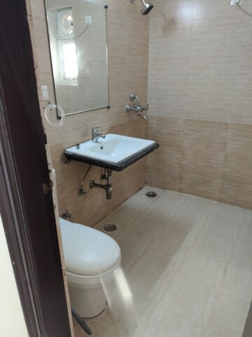 Bathroom in 3 BHK Apartment at Apex Athena, Sector 75 – for Rent
