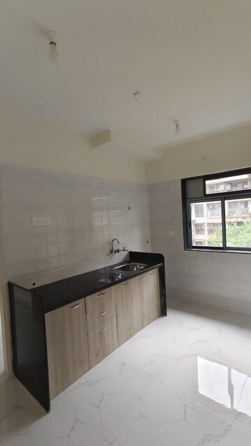 Kitchen in 1 BHK Apartment at Tisai Apartment, Kalyan East – for Sale