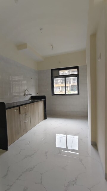 Kitchen in 1 BHK Apartment at Tisai Apartment, Kalyan East – for Sale