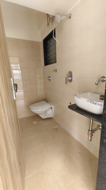 Bathroom in 2 BHK Apartment at Tisai Apartment, Kalyan East – for Sale