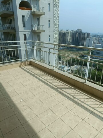 Balcony in 3.5 BHK Apartment at Puri Diplomatic Greens Villas, Sector 111 – for Rent
