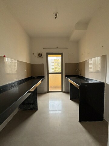 Kitchen in 1 BHK Apartment at Lodha Casa Rio, Dombivli East – for Rent