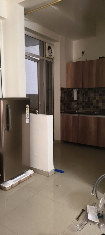 Kitchen in 2 BHK Apartment at Prateek Grand Carnesia, Siddharth Vihar – for Rent