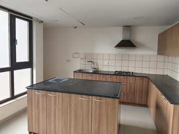 Kitchen in 4 BHK Apartment at Panchshil One North, Magarpatta City – for Sale