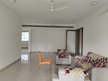 Living Room in 4 BHK Apartment at Panchshil One North, Magarpatta City – for Sale