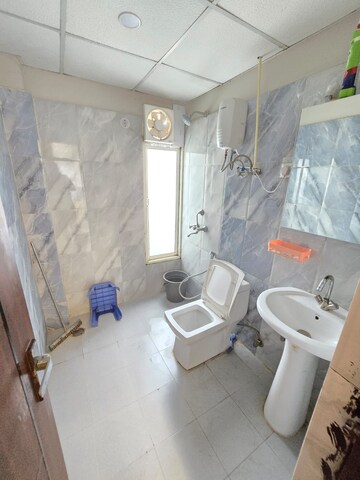 Bathroom in 3 BHK Apartment at Keltech Golf Vista, Dundahera – for Rent