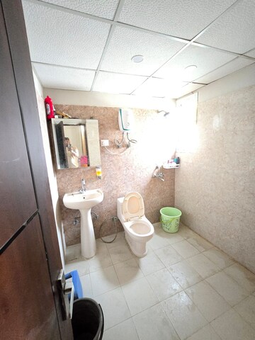 Bathroom in 3 BHK Apartment at Keltech Golf Vista, Dundahera – for Rent
