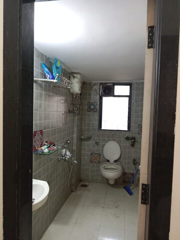 Bathroom in 2 BHK Apartment at Atul Blue Orbit, Malad West – for Rent