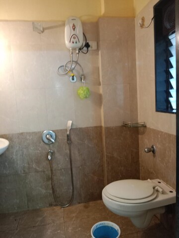 Bathroom in 2 BHK Apartment at Atul Blue Orbit, Malad West – for Rent