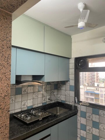 Kitchen in 2 BHK Apartment at Paradise Sai Icon, Kharghar – for Rent