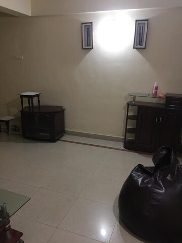 Living Room in 2 BHK Apartment at Castle Rock Apartment, Bhakti Park – for Rent