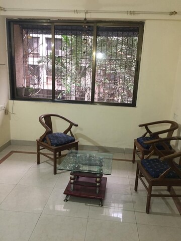 Living Room in 2 BHK Apartment at Castle Rock Apartment, Bhakti Park – for Rent