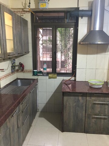 Kitchen in 2 BHK Apartment at Castle Rock Apartment, Bhakti Park – for Rent