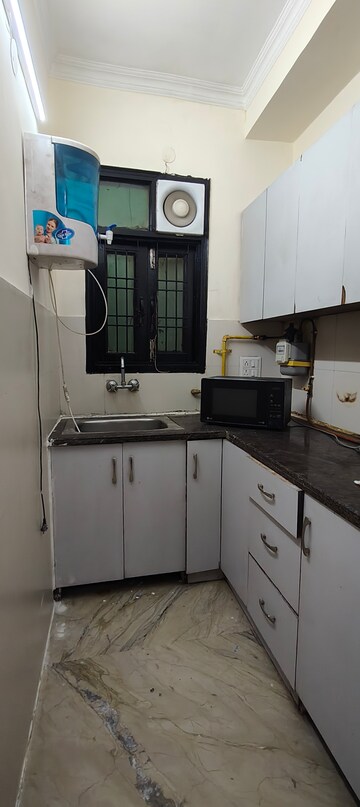 Kitchen in 2 BHK Builder Floor at Chattarpur – for Rent