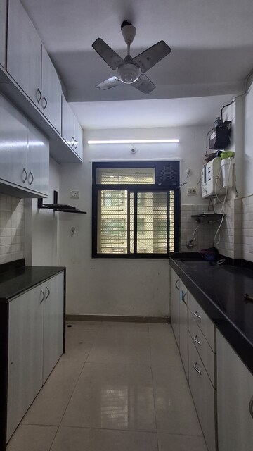 Kitchen in 1 BHK Apartment at RNA NG Suncity Phase II, Kandivali East – for Sale