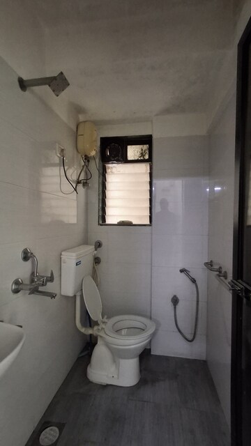 Bathroom in 1 BHK Apartment at RNA NG Suncity Phase II, Kandivali East – for Sale