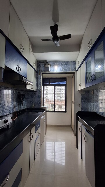 Team Area in 2 BHK Apartment at RNA NG Suncity Phase II, Kandivali East – for Rent