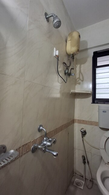 Team Area in 2 BHK Apartment at RNA NG Suncity Phase II, Kandivali East – for Rent