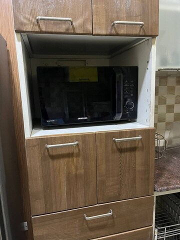 Kitchen in 2 BHK Apartment at Gaur City 2 - 14th Avenue, Sector 16c Greater Noida – for Rent