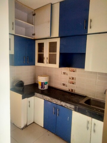 Kitchen in 2 BHK Apartment at Charms Castle, Raj Nagar Extension – for Rent