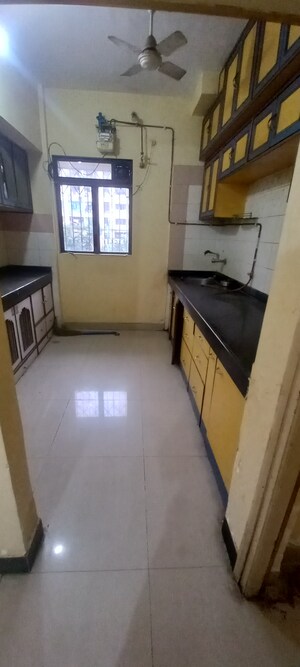 Kitchen in 1 BHK Apartment at Cosmos Heritage, Manpada – for Sale