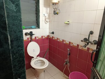 Bathroom in 2 BHK Apartment at Padma Prabha CHS, Bangur Nagar – for Rent