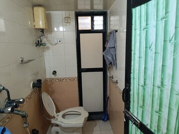 Bathroom in 2 BHK Apartment at Padma Prabha CHS, Bangur Nagar – for Rent