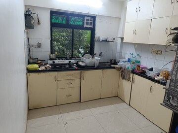 Kitchen in 2 BHK Apartment at Padma Prabha CHS, Bangur Nagar – for Rent