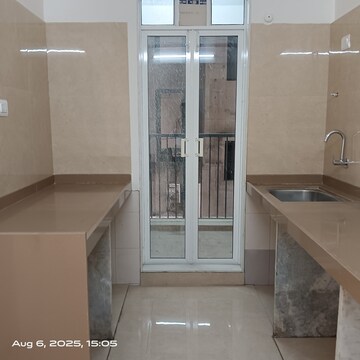 Kitchen in 2 BHK Apartment at Kiran Swastik, Sus – for Sale