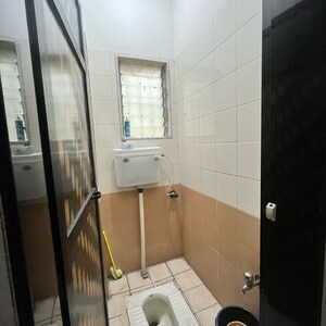 Bathroom in 1 BHK Apartment at New Brahmand Phase 7 CHS, Kiran Mill Colony – for Sale