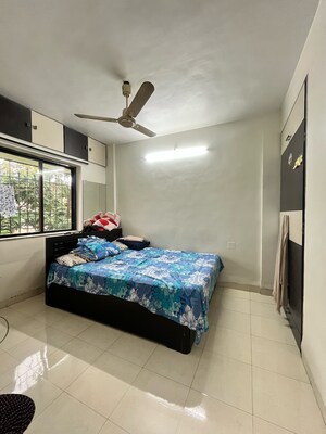 Bedroom in 1 BHK Apartment at New Brahmand Phase 7 CHS, Kiran Mill Colony – for Sale