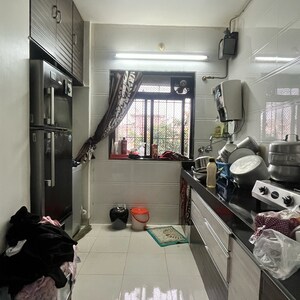 Kitchen in 1 BHK Apartment at New Brahmand Phase 7 CHS, Kiran Mill Colony – for Sale