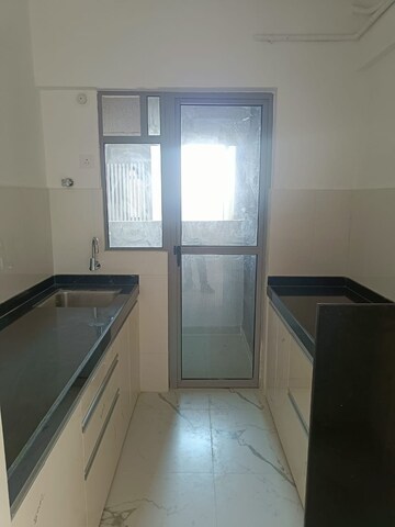 Kitchen in 1 BHK Apartment at Dynamix Avanya, Dahisar East – for Rent