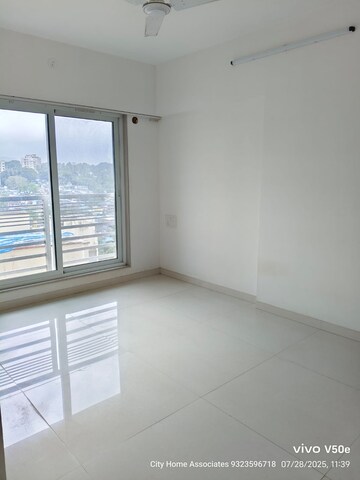 Room in 2 BHK Apartment at Romell Allure, Borivali East – for Rent