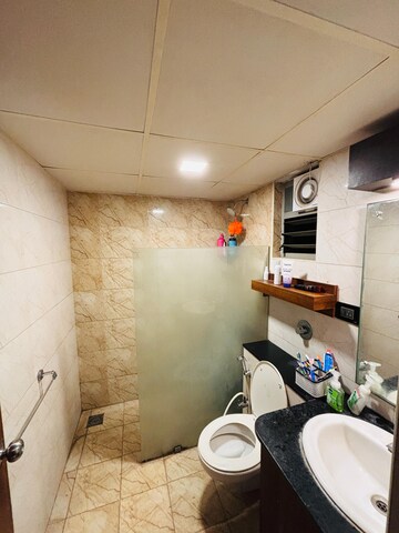 Bathroom in 3 BHK Apartment at Orchid Woods, Hennur – for Rent