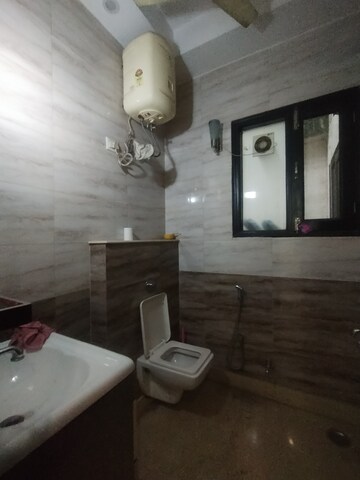 Bathroom in 3 BHK Builder Floor at Ansal Sushant Lok I, Sector 43 – for Rent