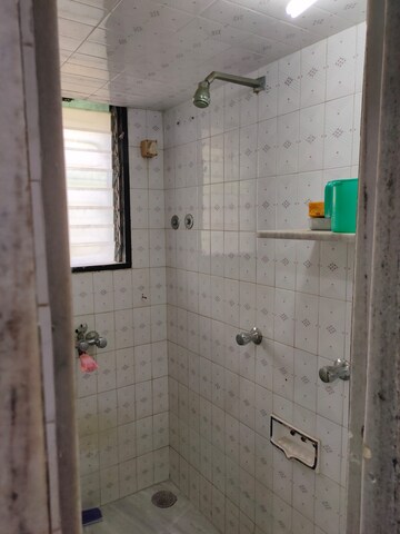 Bathroom in 1 BHK Apartment at Ganesh Chhaya CHS Borivali, Yogi Nagar – for Rent