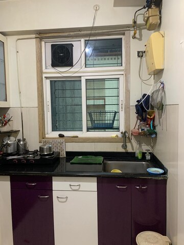 Kitchen in 3 BHK Apartment at Vijay Nagari Annex, Waghbil – for Rent