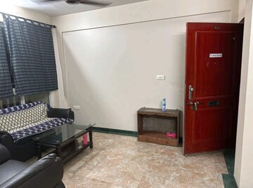 Living Room in 1 BHK Apartment at Hiranandani Estate Penrose, Thane West – for Rent
